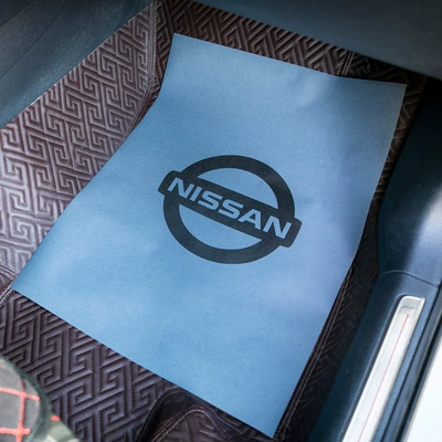 Universal Foot Pad — Paper Replaces Cowhide Foot Mat Paper - 4253-enlarged-gray-nissan-logo-50-sheets