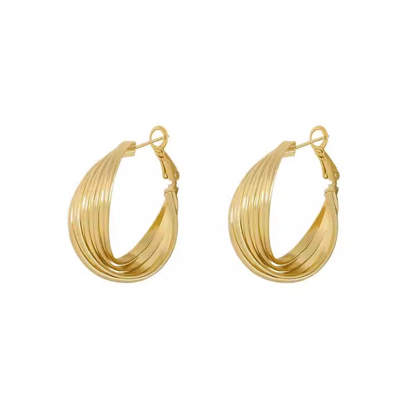 Aretes de metal irregulares de alto nivel de lujo ligero femenino nicho sensación de diseño de red temperamento exagerado aretes de aretes