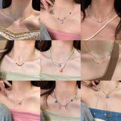 カラーの愛の砕いた銀の鎖のネックレスの女性insの小さい大衆のデザイン感は甘いクールな風の夏の新型の潮を飾ります。