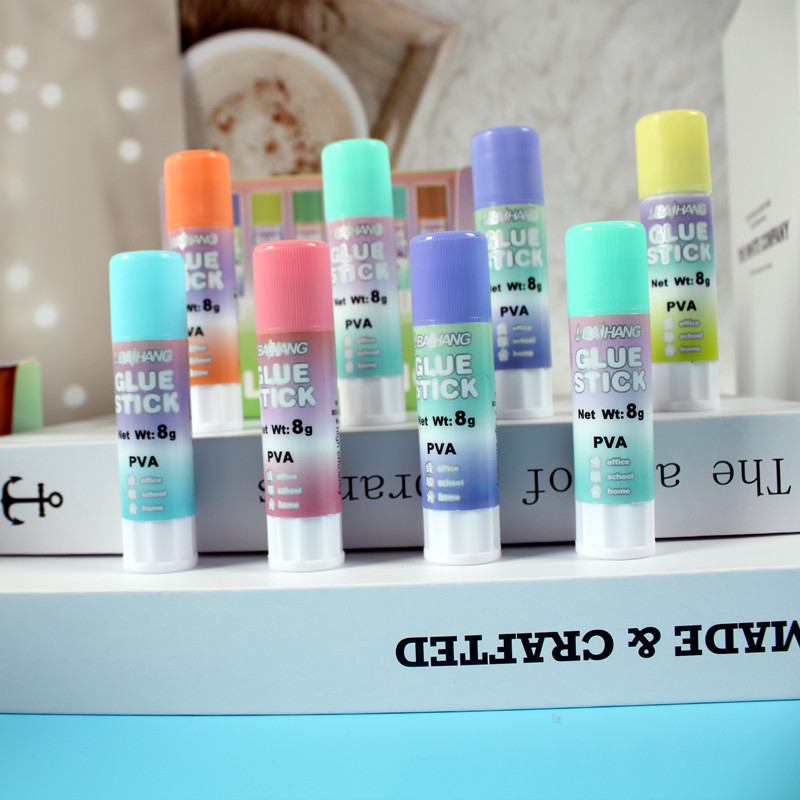 Venta al por mayor estudiante colorido hecho a mano de alta viscosidad fuerte pegamento sólido suministros de oficina pegamento sólido palo niños papelería suministros