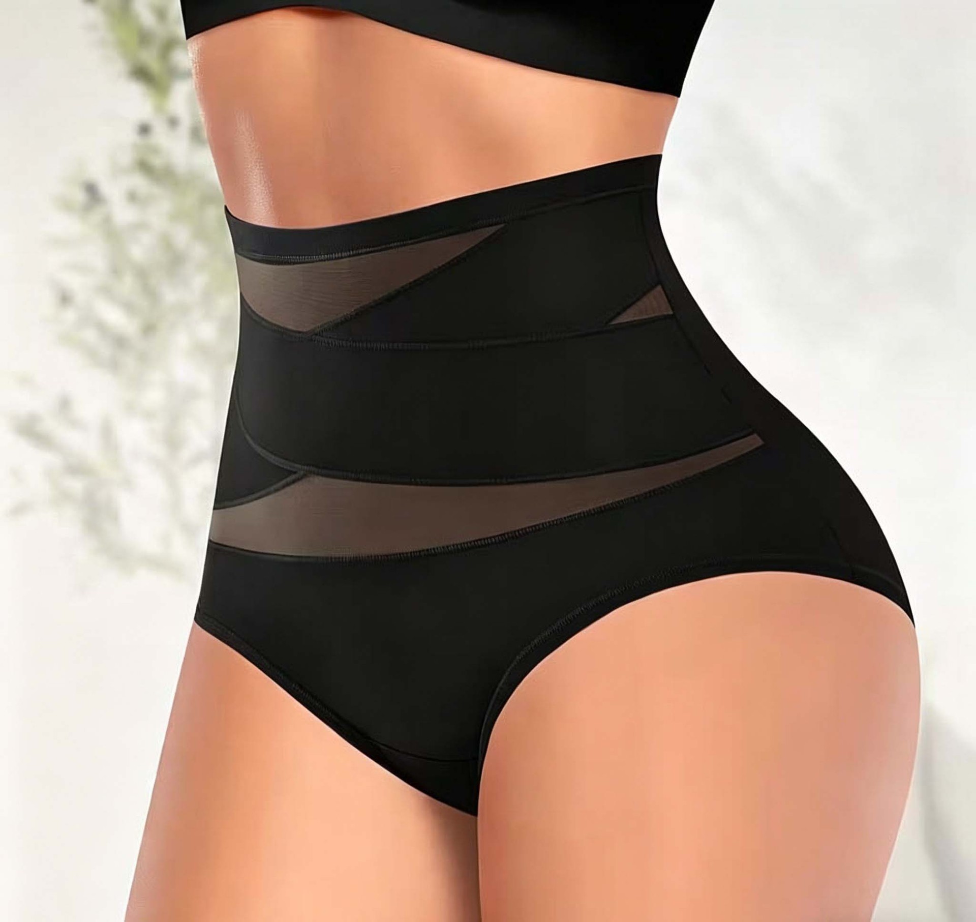 High-waisted shaping panties for waist-cinching and hip-lifting.