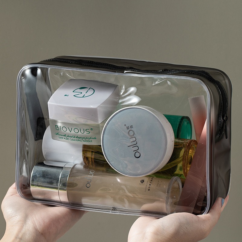 2025 nueva bolsa de cosméticos transparente de alta gama para mujer bolsa de almacenamiento de lavado a prueba de polvo de viaje portátil de gran capacidad impermeable