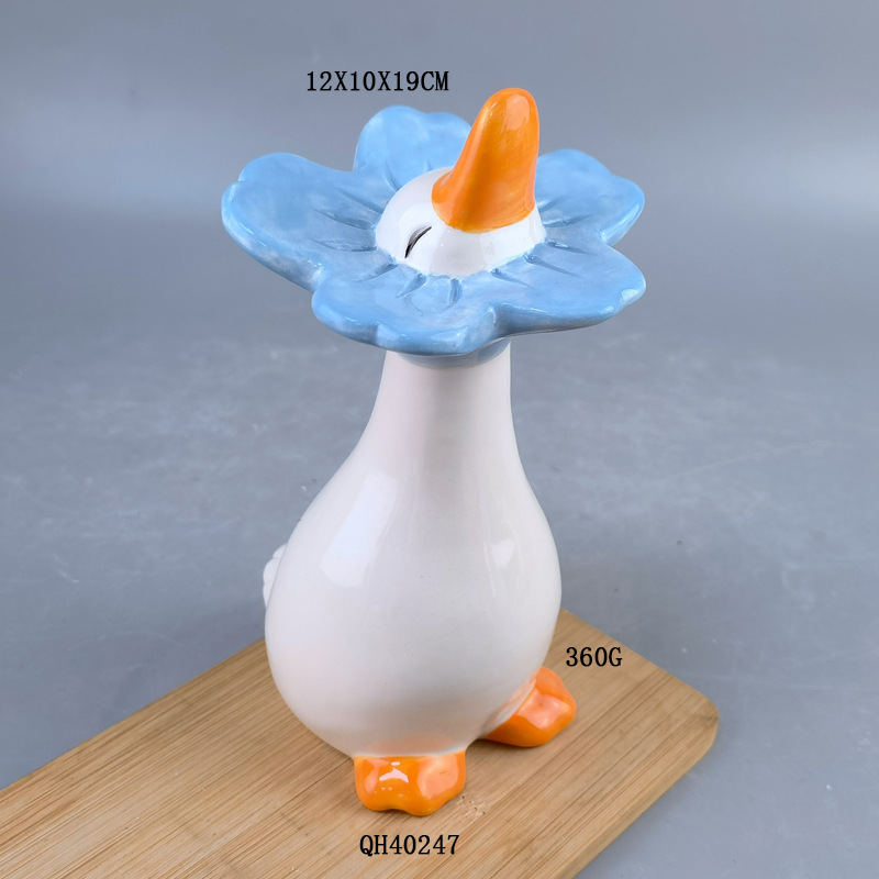Artualidades de cerámica creativas de pato lindo nuevo estilo chino decoración de tres piezas para el hogar adornos de animales pato absorbente