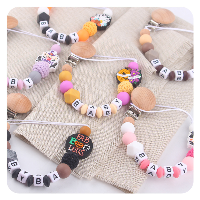 Productos para bebés, juguetes de planeta creativo, pinza de chupete de madera, cadena de chupete de silicona para bebés, cadena anti-caída