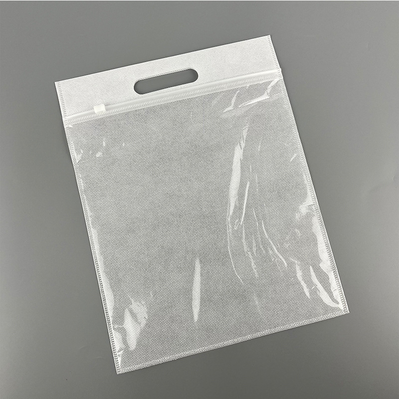 En stock no tejido cremallera bolsa bolso ropa bolsa de embalaje al por mayor ziplock bolsa no tejida transparente cremallera bolsa