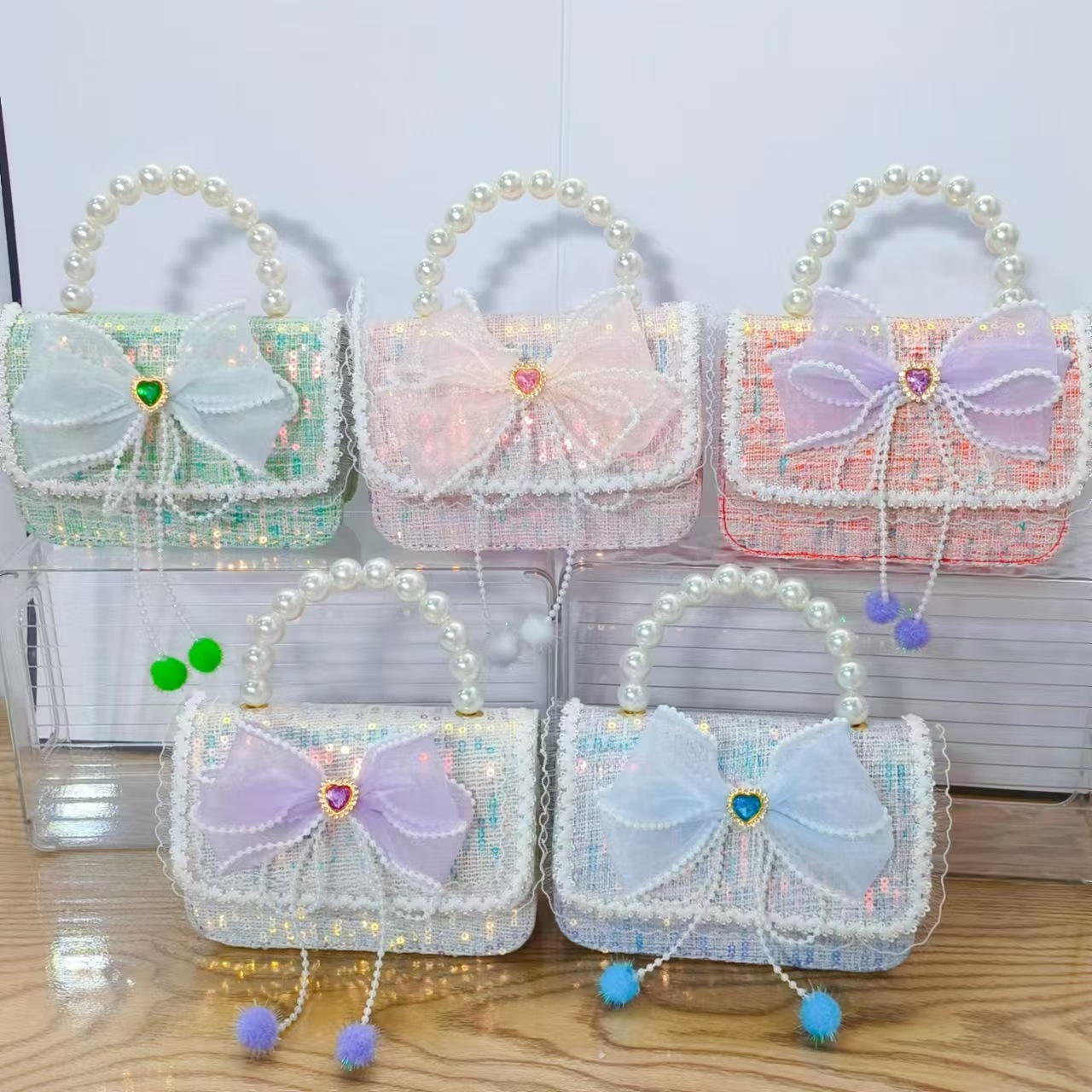 Bolso de arco princesa bolso de perlas bolso de mano cadena bolso de niños pequeño viento fragante bolso de hombro para chicas regalos