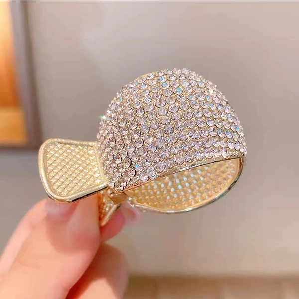 Golden rhinestone semi -circular ponytail