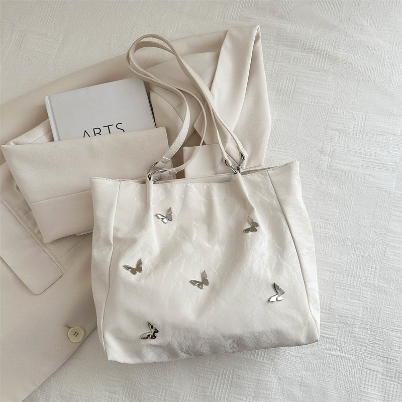 Bolso de viaje popular de gran capacidad de este año 2024 nuevo arco de moda bolso de hombro de mujer bolso universal