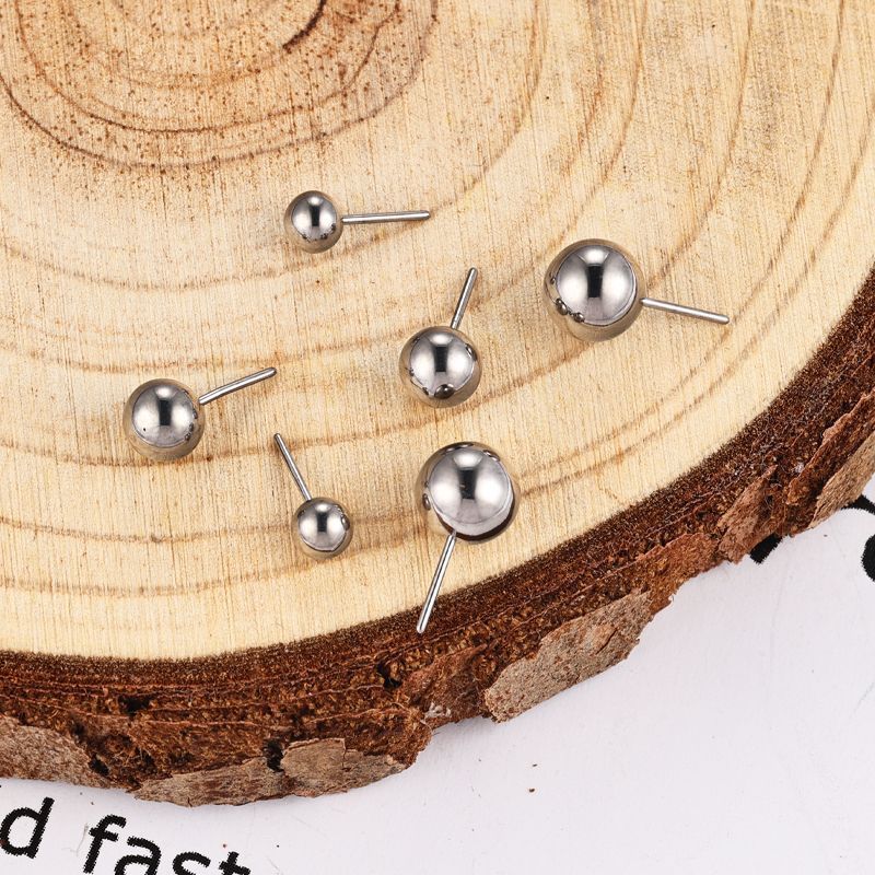 Silver pointed spike labret stud material detail