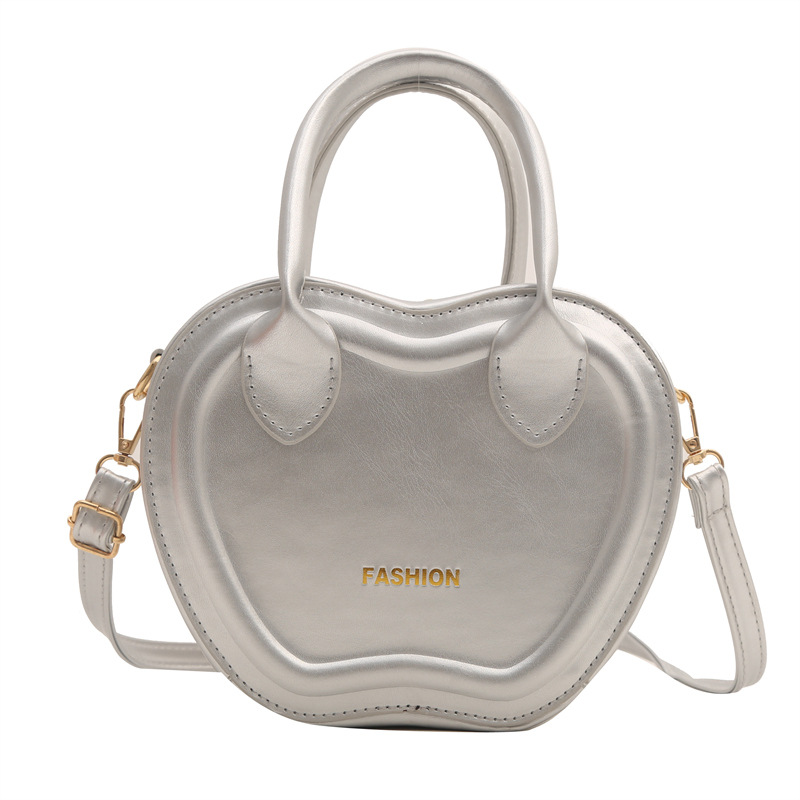 Bolso de mujer 2024 verano nuevo bolso de moda empujada textura PU bolso de hombro simple color sólido mochila de viaje