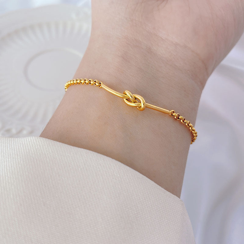 New Japanese and Korean Style Simple Knot Titanium Steel Bracelet Design Sense Niche 18K Gold Cold Style Elegant All-match Bracelet New Japanese and Korean Style Simple Knot Titanium Steel Bracelet Design Sense Niche 18K Gold Cold Style Elegant All-match Bracelet