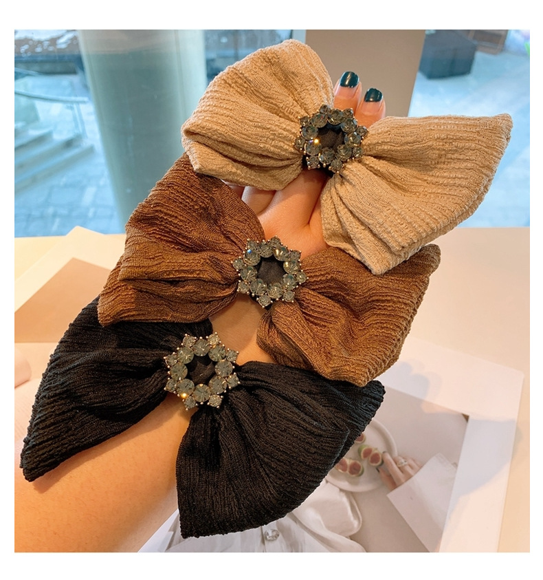 Retro Diamond Wave Embossed Folds Bow Hair Scrunchies display picture 1