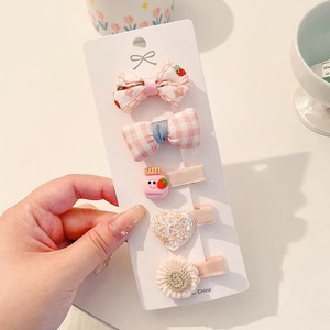 Hermosos clips de cabello de color para niños coreanos de alto nivel sensación de arco de niñas bolsa de tela no daña clips de cabello de bebé