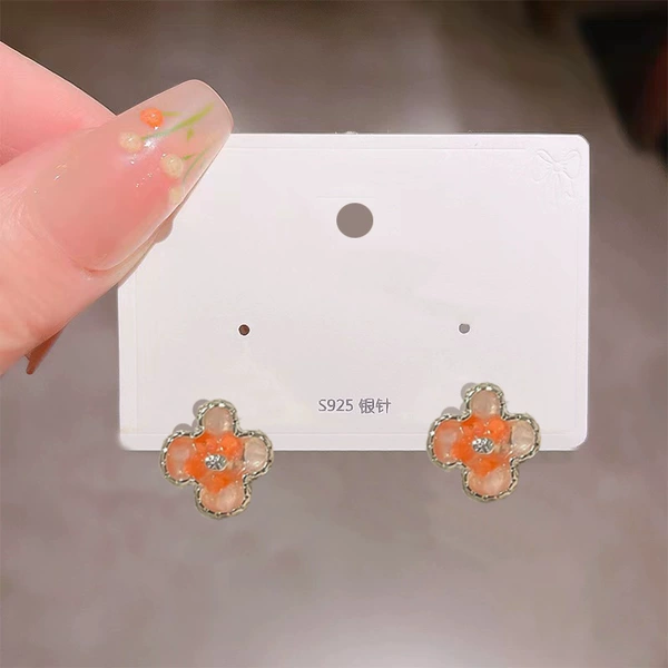 Orange earrings, flowered
