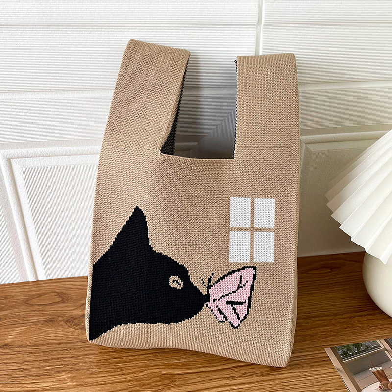 Bolsa de las mujeres de estilo coreano diseño de nicho lindo bolso de mano de punto de dibujos animados calle estudiante gran capacidad bolsa de las axilas