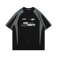 アメリカのレトロな肩の半袖のtシャツのファッション的な街頭は色のゆったりした短いt男女のカップルの半袖の上着にぶつかります。