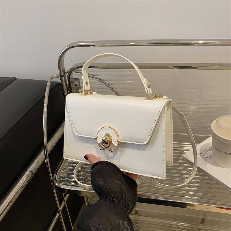 Textura bolso de moda bolso femenino 2024 verano nuevo estilo moda diseño de nicho bolso de hombro caja de estilo occidental bolso de mensajero