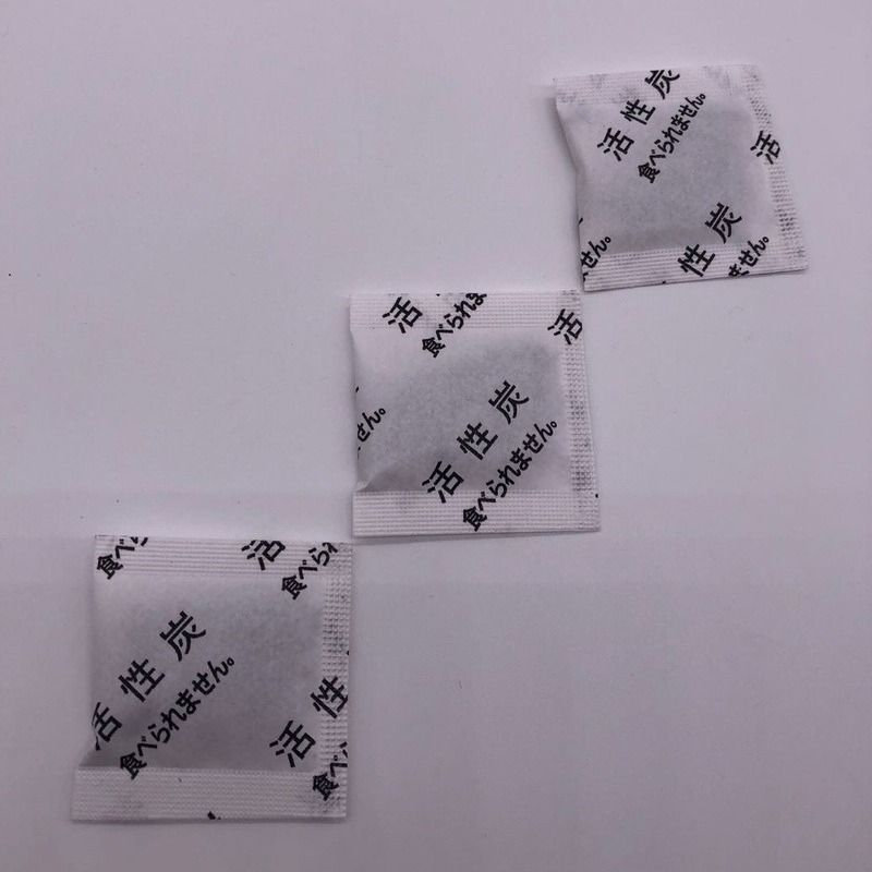 Spot 2g 3g 5g 10g chino japonés carbón activado paquete desecante taza de té paquete desodorante taza de plástico desodorante