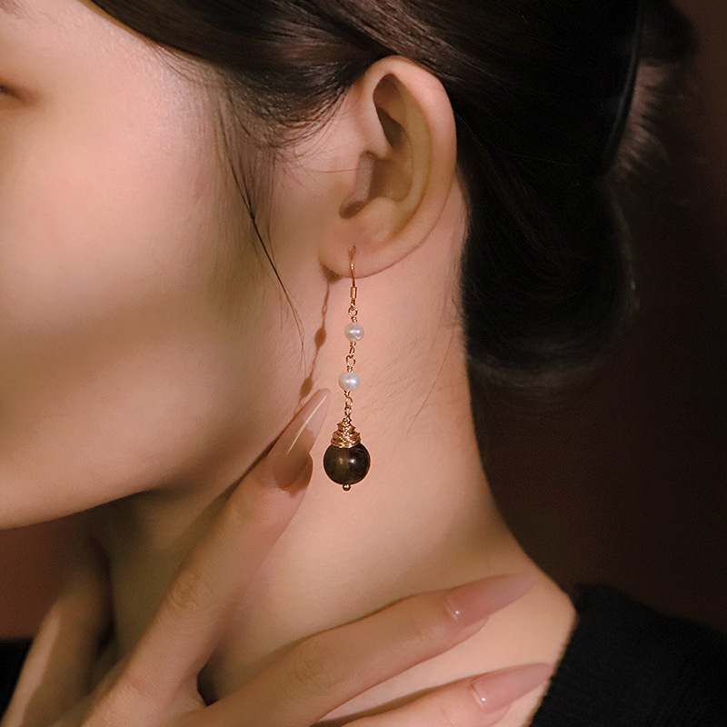 Perla natural original ojo de tigre gancho pernos de orejas retro alta sensación de aretes temperamento aretes de orejas al por mayor