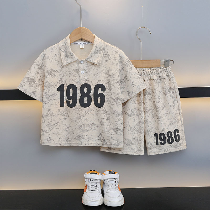 7189 ropa de verano para niños 2025 nuevo traje deportivo de camisa polo para niños de manga corta para niños de mediana edad y grandes