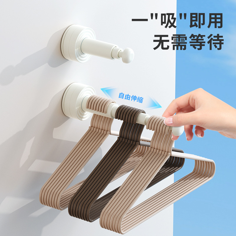 吸盘衣架收纳架免打孔可伸缩杆家用阳台墙上壁挂式晾衣架整理神器