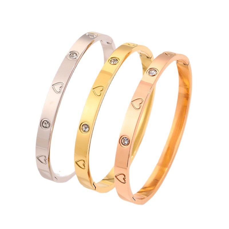 Pulsera clásica con forma de corazón y diamantes incrustados, resistente a la decoloración, para niñas, de alta gama, lujo ligero, a la moda, pulsera de acero de titanio, joyería superventas transfronteriza. image 7