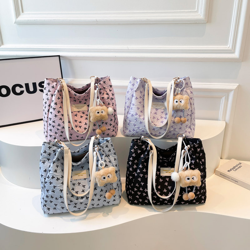 Bolso de tote 2025, primavera y verano, nuevo tipo de bolso de hombro, moda, bolso de mano, bolso de viaje de estilo extranjero para mujeres.