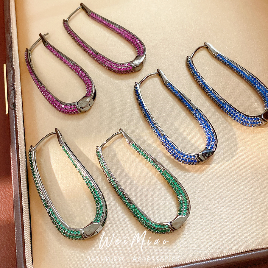 Medieval vintage zircón oval pendientes de estilo retrógrado personalidad pendientes ligeros de lujo alta sensación auriculares al por mayor