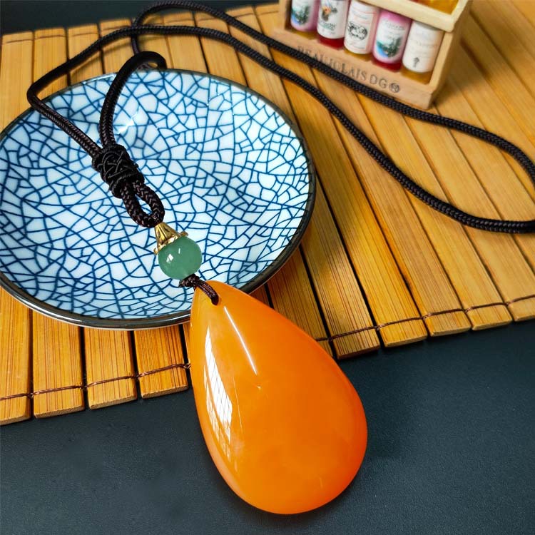 现货厂家直销新款民族仿蜜蜡水滴毛衣链棉麻服饰配饰长款项链女