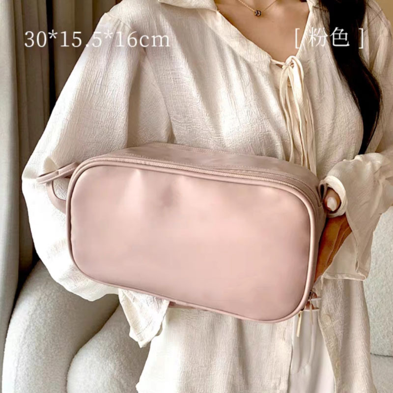 Bolsa de cosméticos súper popular para mujeres de gran capacidad portátil de viaje 2023 nuevo cepillo de maquillaje de alta calidad bolsa de almacenamiento de artículos de tocador