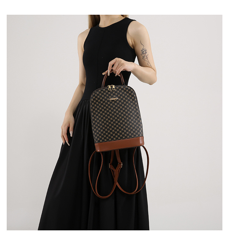 A stylish and trendy casual backpack for the 2024 autumn and winter season, featuring a large-capacity single-shoulder women's retro commuting crossbody bag undefined