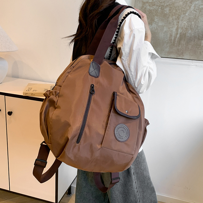 2024 otoño y invierno nuevo estilo bien sensación de alta calidad compacta simple versátil gran capacidad viaje de negocios mochila de hombro