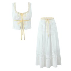 休日の雰囲気感フレンチレースのつぼみが色にぶつかったストラップの小さいキャミソールの長いスカートのリゾート風のスーツ