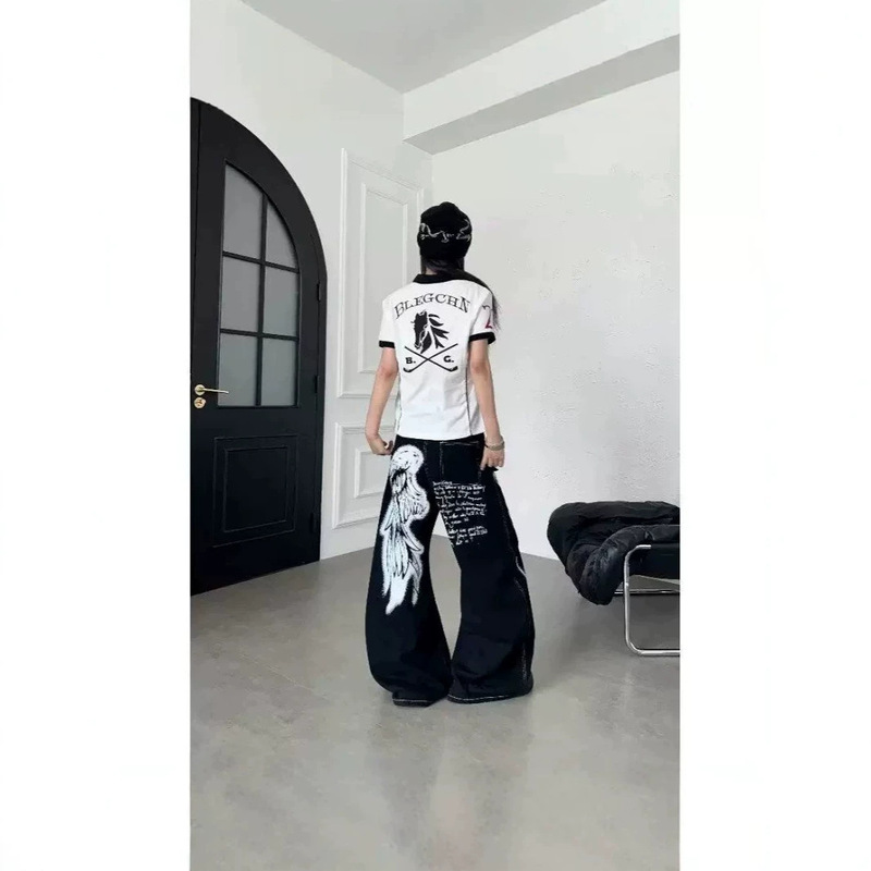 American-style light streetwear wing-print scythe jeans for men and women, summer graffiti contrast-stitch loose wide-leg pants American-style light streetwear wing-print scythe jeans for men and women, summer graffiti contrast-stitch loose wide-leg pants