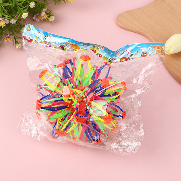 Children's magic telescopic ball player grabs and kicks the flower…