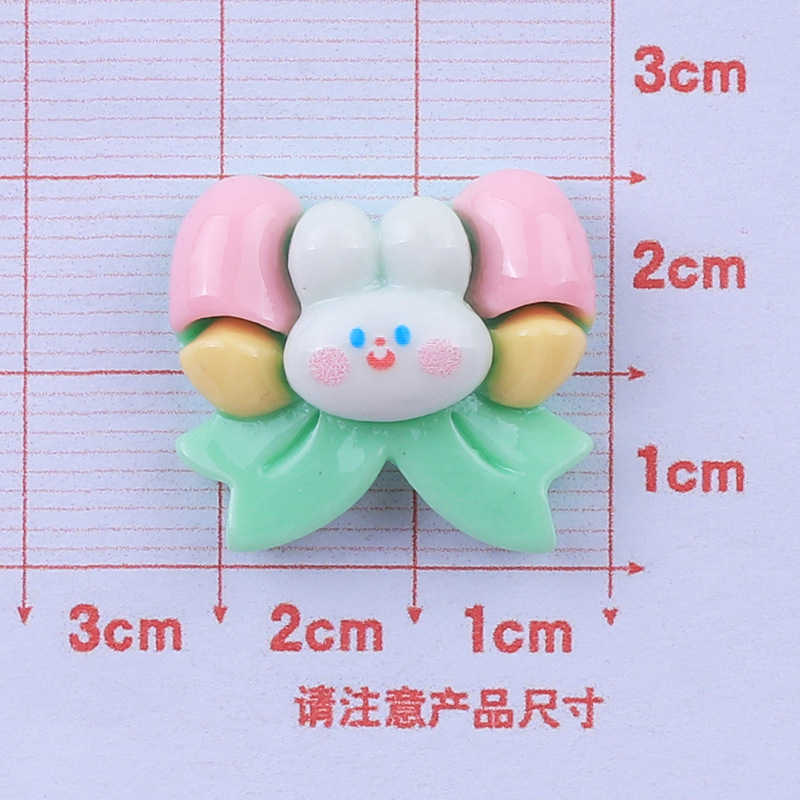 Brillante conejo blanco resina accesorios DIY crema pegamento sosteniendo flor conejo parche taza de agua pegatinas cuerda de pelo accesorios para el cabello banda de goma paquete de material