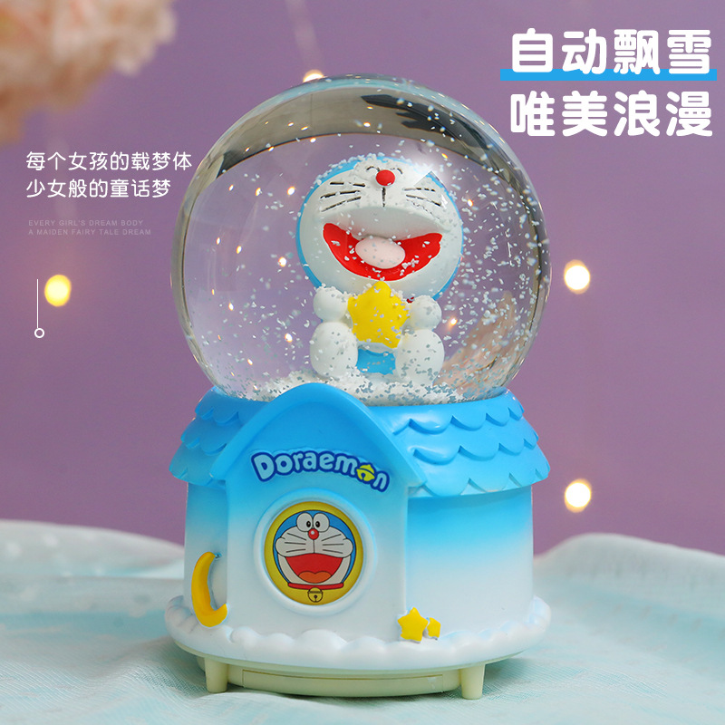 Nueva bola de cristal Doraemon Jingdang gato caja de música automática nieve azul claro grasa regalo de vacaciones