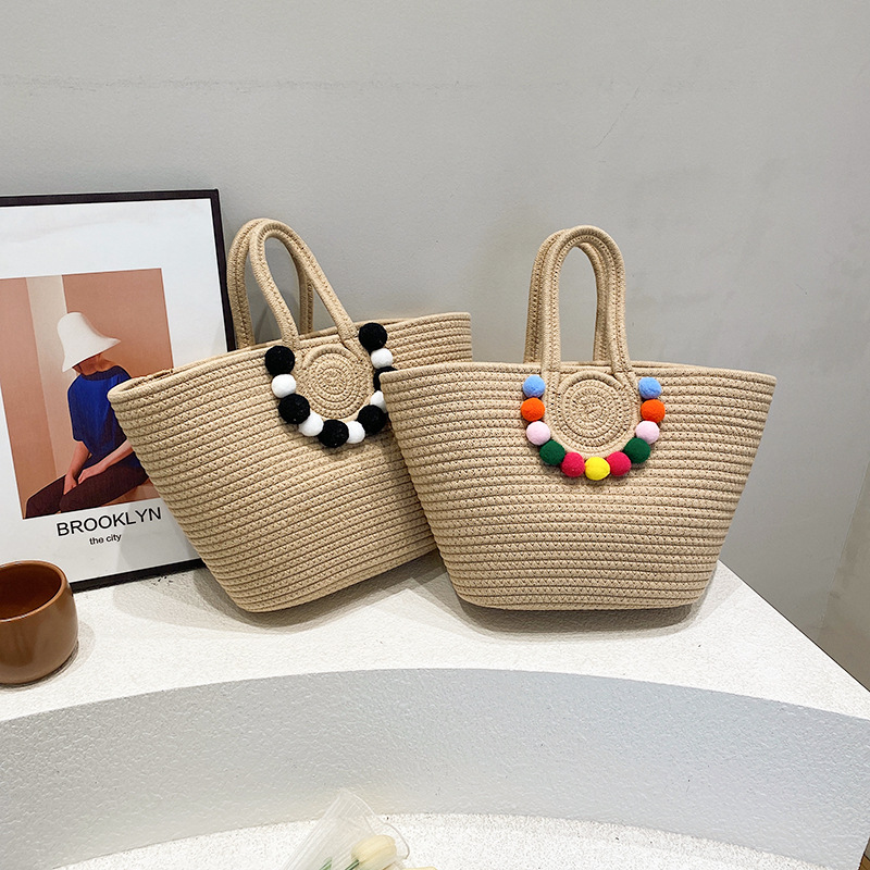 Una pieza de envío, versión coreana del bolso tejido de paja con cuerda de algodón, bolsa tejida con canasta de bolas de lana, bolsa de textura de alta calidad