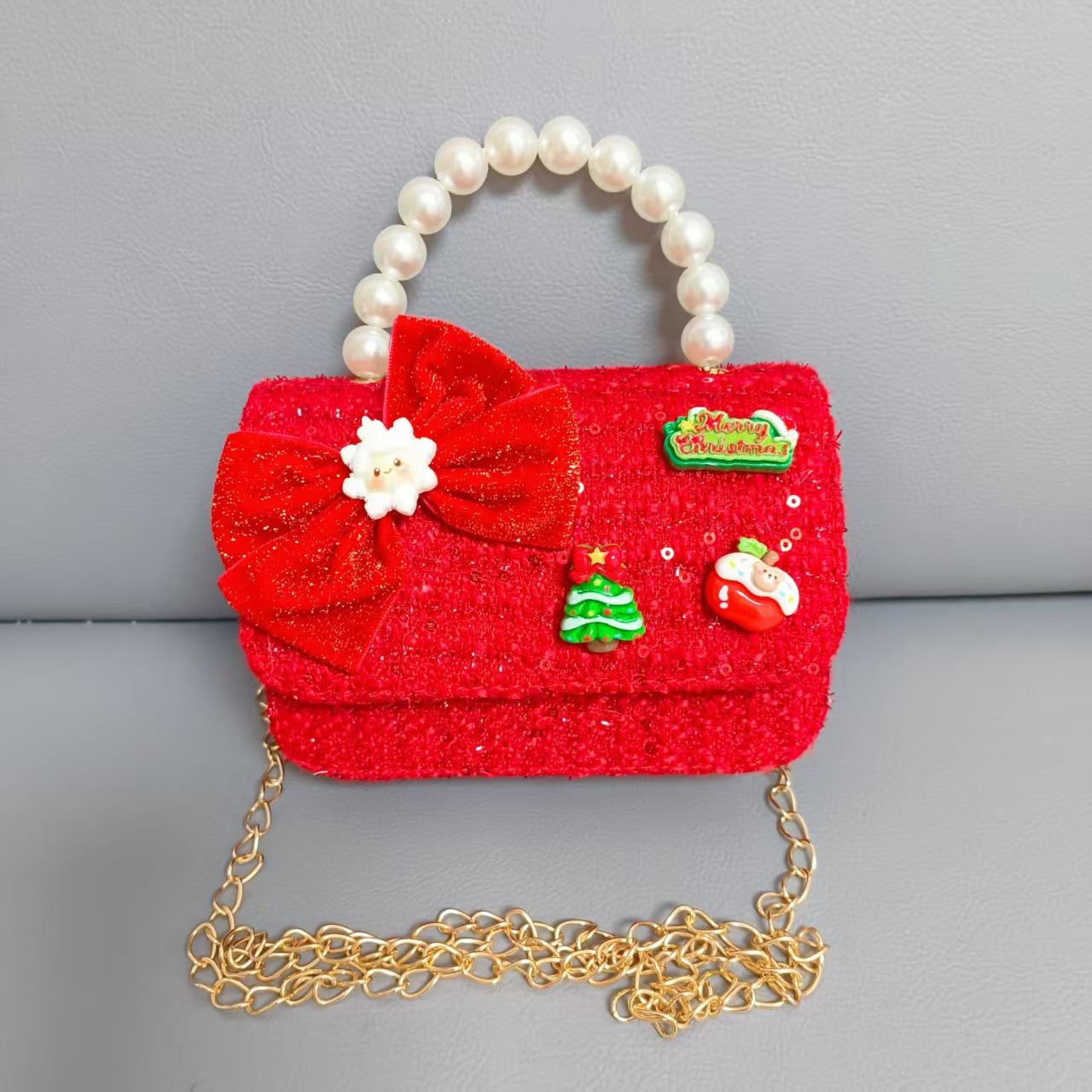 Cartera de Año Nuevo rojo arco de papá Noel bolso de perla pequeña cadena de viento fragante bolso de hombro