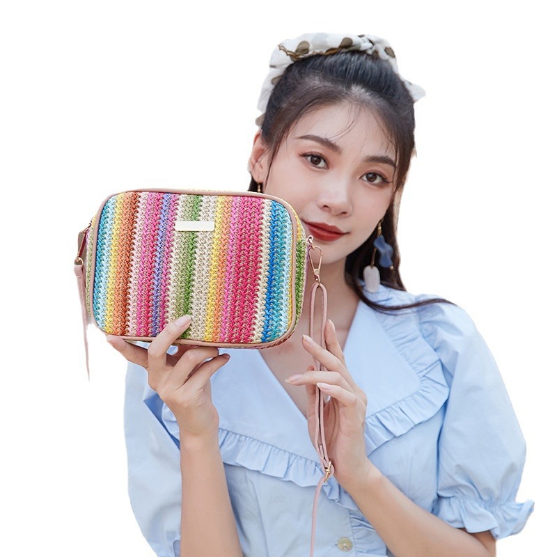 Fábrica directa 2023 nuevo estilo simple de moda de calle de paja bolsa de moda trenzada estilo extranjero de moda mochila de hombro image 6