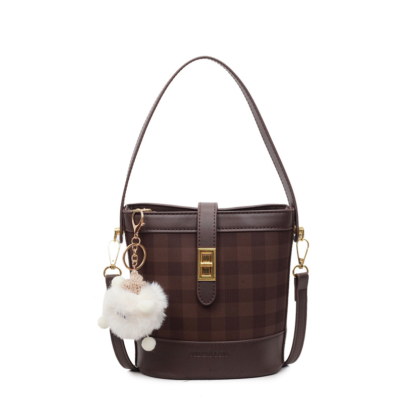 Bolso de cubo de moda para mujeres 2025, otoño y invierno, nuevo bolso retro, bolso de hombro de textura universal, bolso de mochila