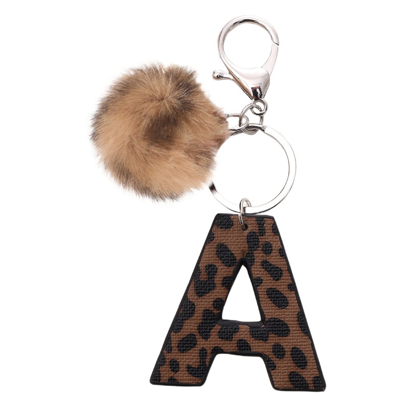 Llavero de acrílico con borde de aceite y estampado de leopardo estilo vaquero occidental, accesorios de bola de felpa, Amazon transfronterizo