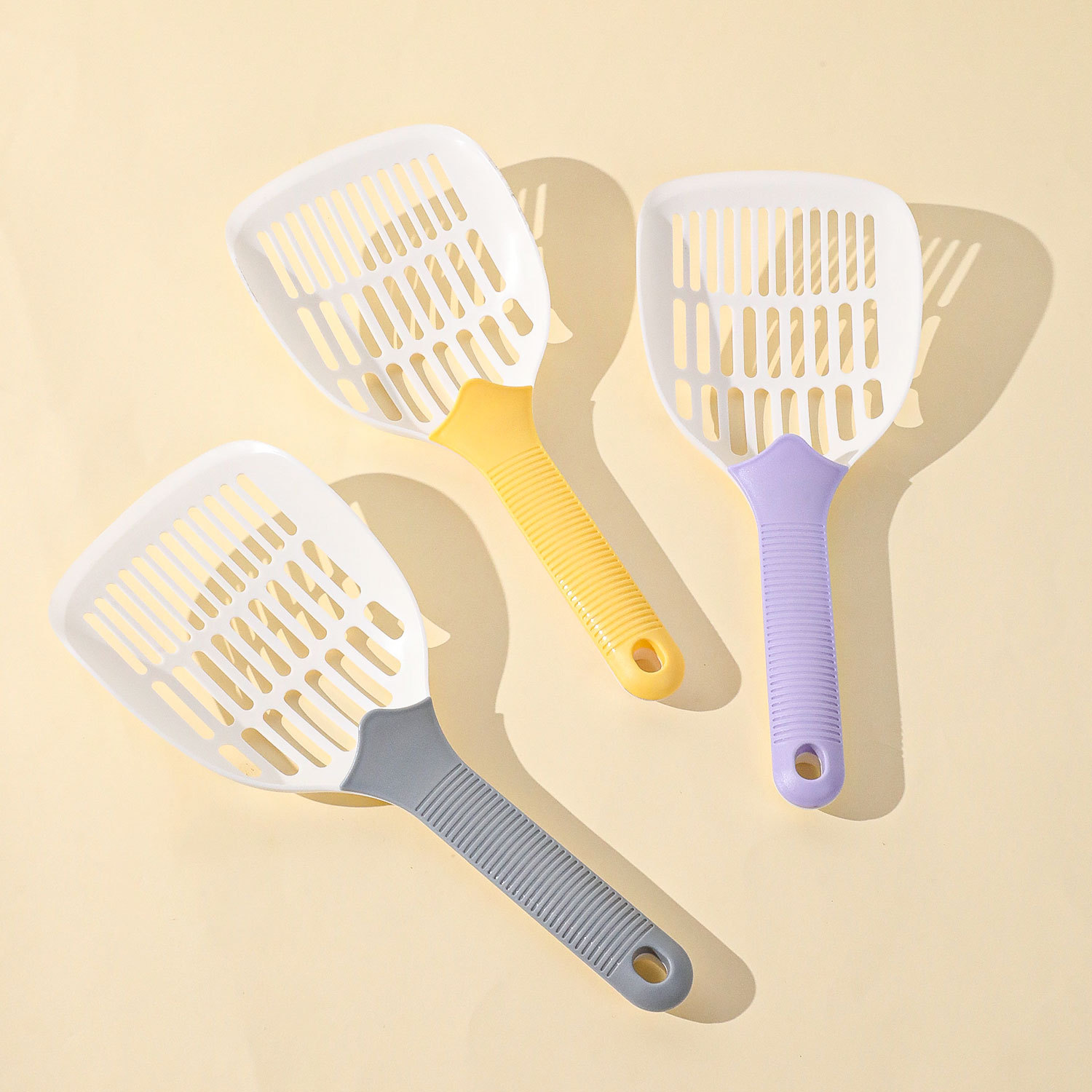 Pala de arena de gato hueca a juego de colores en stock Pipitao Pala de gato de plástico grande Pala de gato Pala de arena de gato simple Pala de mierda