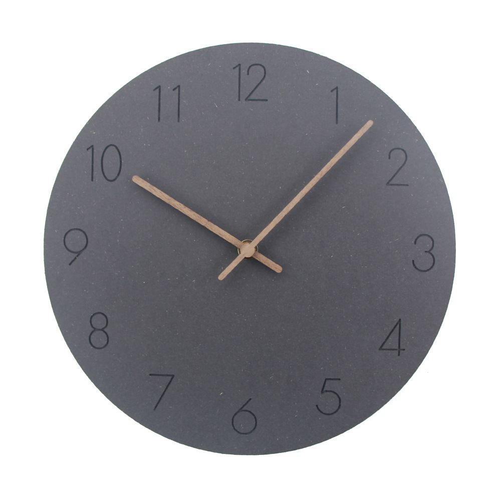 Reloj de estilo europeo del norte español extremadamente simple reloj de pared de madera reloj de madera sala de estar creativa reloj mudo Reloj de pared