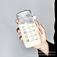 ミルクカップ耐高温ガラス学生携帯マイクロ波豆乳カップ家庭用蓋付き目盛カップシール