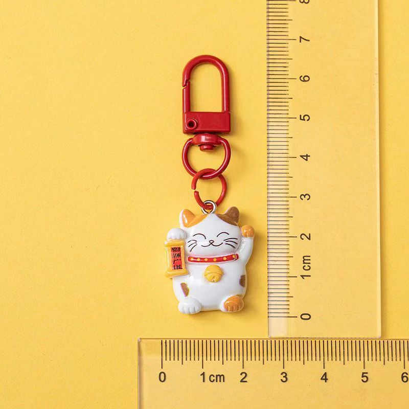 Cute mini gato pequeño colgante llavero yuanbao bolsas de Año Nuevo chino artesanías de resina regalos de decoración