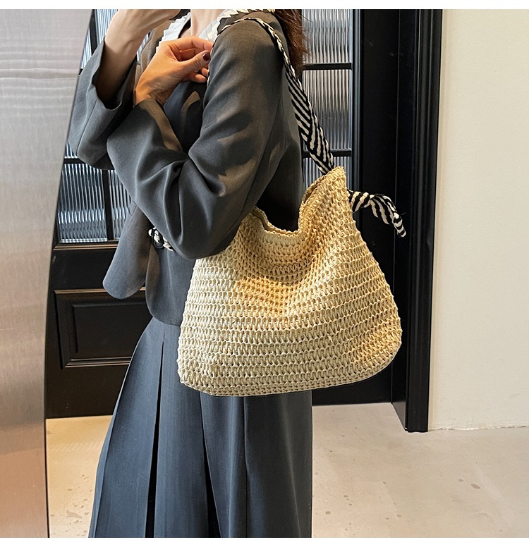 Summer large-capacity straw woven bag for women, 2025 new style seaside and beach vacation single-shoulder bag, commuter tote bucket bag undefined