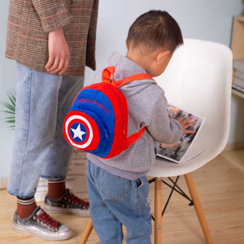 Bolso de felpa informal para bebés transfronterizos, monedero de año, reducción de la carga, mochila de comercio exterior de dibujos animados, mochila de ocio