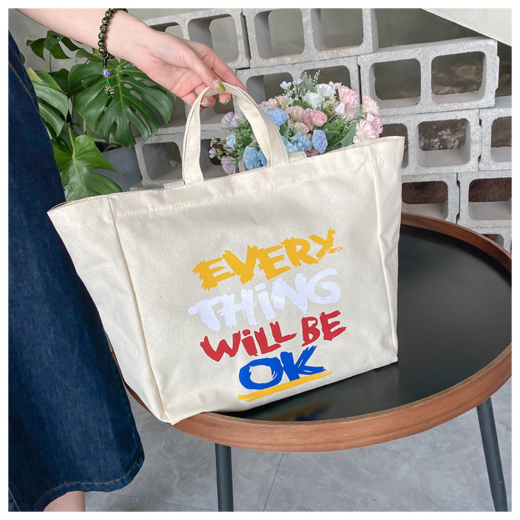 A large-capacity, sturdy Japanese-style canvas bag for women, a new 2022 simple bento handbag for girls to go to work undefined
