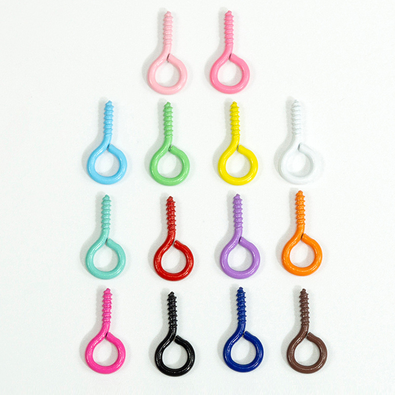 Accesorios de la joyería DIY 100 color spray pintura ovejas cuerno clavo tornillo ojo mirando teléfono caso colgante llavero